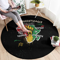 Black round carpet with colorful graffiti-style wording and lion symbol