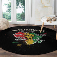 Black round carpet with colorful roots and strength text over lion map graphic