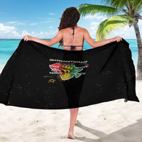 Black African sarong held open, back view with colorful “unapologetically black” artwork