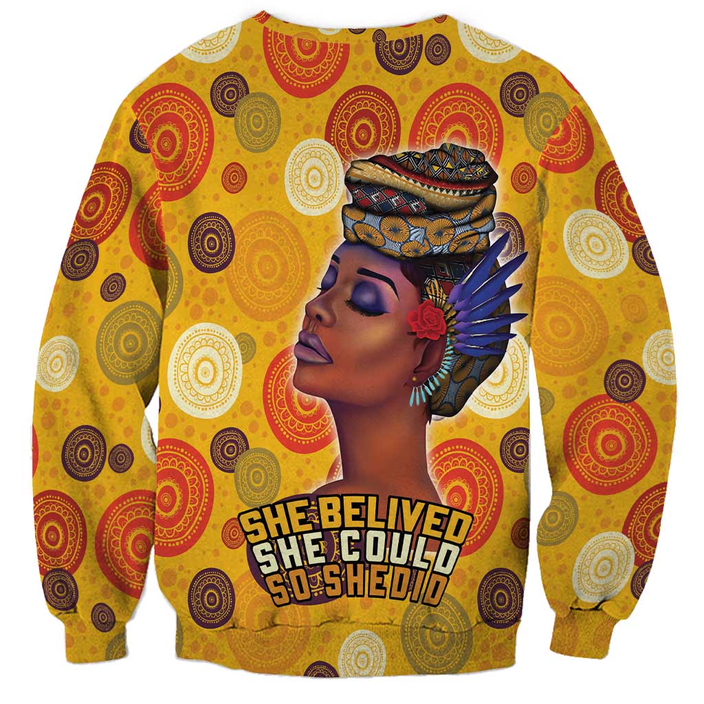 Unisex yellow paisley sweatshirt with side profile woman, red flower, and chest slogan