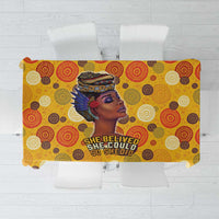 Yellow African print tablecloth with circular motifs and central woman graphic