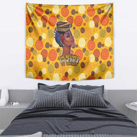 Yellow tapestry wall art with woman profile and “She believed she could” text