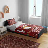 Red corgi Christmas duvet and pillows with snowman figures and 'CORGMAS' text