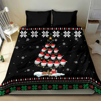 Black Christmas bedding set with penguin family scene and festive patterned bottom border