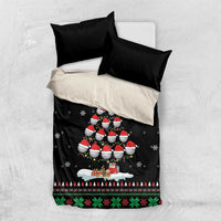 Black Christmas duvet cover with penguin family graphic and festive holiday border design