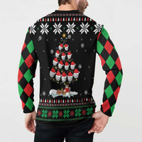 Black crewneck sweatshirt on model with red-green argyle sleeves and snowman back print