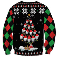 Unisex black crewneck sweatshirt with red-green argyle sleeves and rear snowflake holiday print