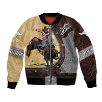 Brown bomber jacket with rodeo cowboy and bull graphic, quilted panel design, snap buttons