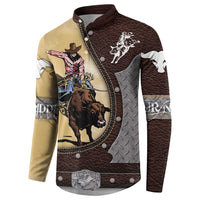 Cowboy graphic snap-front sweatshirt in brown, tan, and white with long sleeve panels.