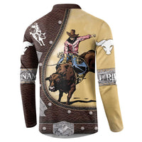 Cowboy graphic snap-front sweatshirt with brown and tan back panel and white sleeve accents.