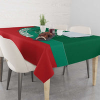 Corner view of green and red Bulgaria lion crest tablecloth with emblem center