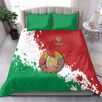Green, red, and white duvet cover set with two green pillowcases and circular emblem graphic
