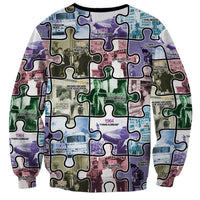 Unisex crewneck sweatshirt with multicolor puzzle collage, long sleeves, white neckline