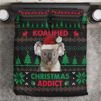 Koala Christmas bedding set top view: black duvet with KOALIFIED and CHRISTMAS ADDICT text