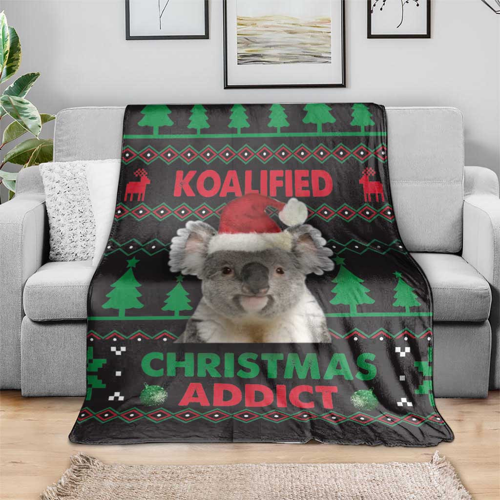 Koala Christmas blanket draped on sofa, Santa-hat koala with green tree pattern