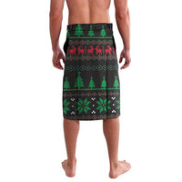 Men's dark Christmas patterned wrap shorts, rear view with trees, icons, and stripes