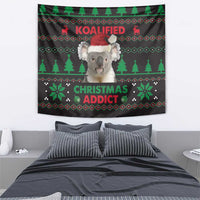 Black koala tapestry with red santa hat, green trees, and “CHRISTMAS ADDICT” center text