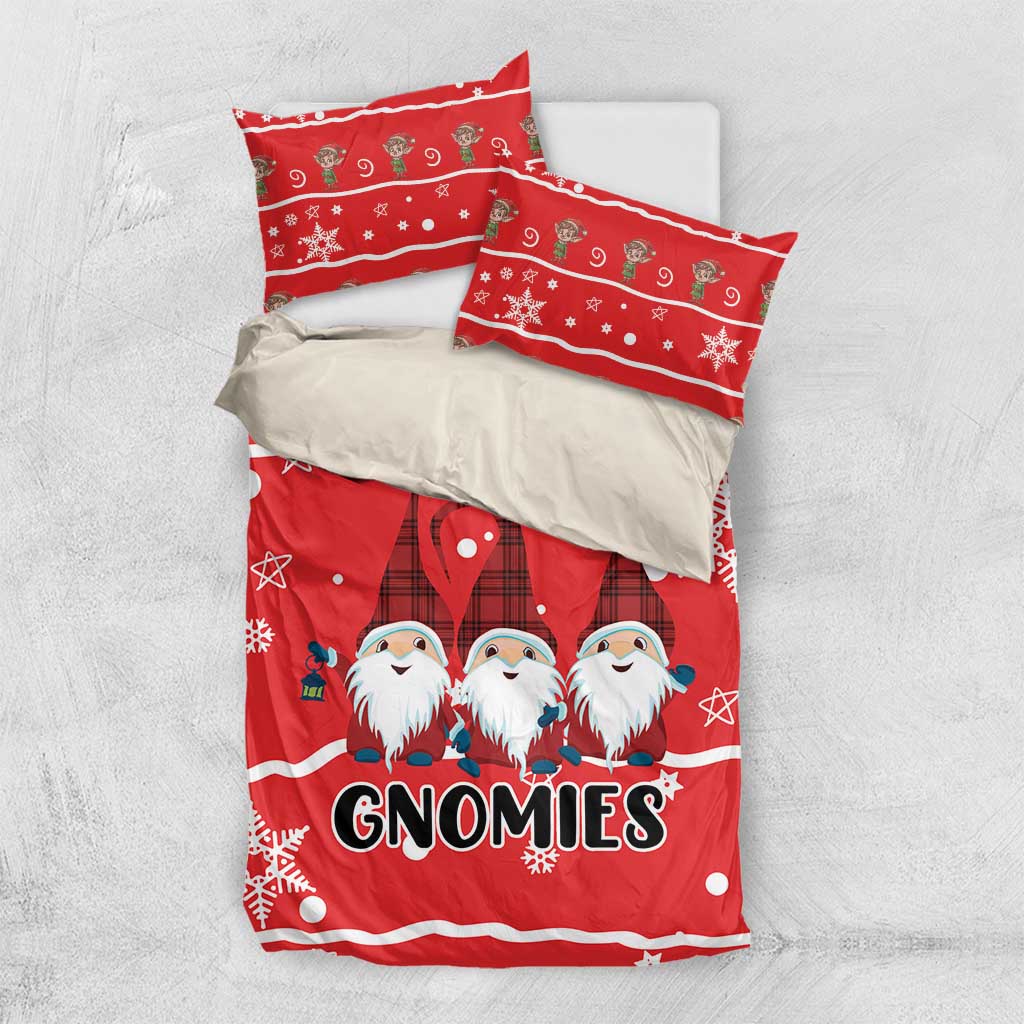 Red duvet set with three gnomes, snowflake pattern, and two red pillowcases