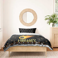 Black duvet bedding set with centered fireball print and star-patterned accents