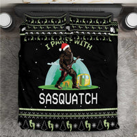 Black duvet cover and pillow set with Sasquatch campsite graphic and green holiday border