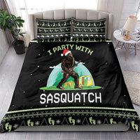 Black camping bedding set with Sasquatch tent graphic and green patterned trim on bed