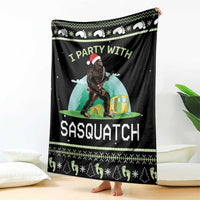 Black camping blanket featuring Sasquatch by a tent and large “SASQUATCH” lettering