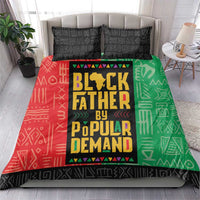 African bedding set with 2 black geometric pillowcases; red/green/black 'Black Father' duvet.