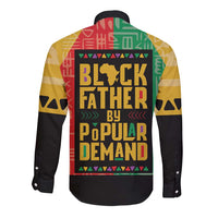 Black long-sleeve button shirt with African geometric print, back view