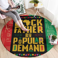 Round rug featuring "Black Father by Popular Demand" typography on circular red green pattern