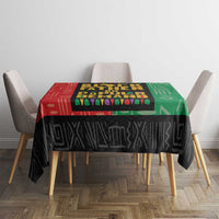 African tablecloth with colorful 'BLACK FATHER' text panel and black geometric bottom