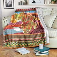 Red Christmas-themed throw blanket with Africa map, ornaments, trees, and patterned border