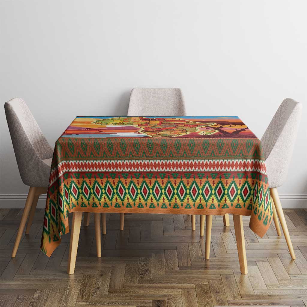Christmas tablecloth draped on dining table with geometric green-red border design