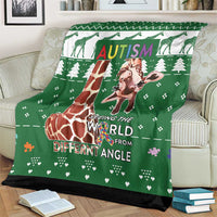 Green giraffe autism throw blanket with colorful text and giraffe graphic