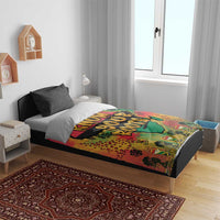 Bedding set with graffiti African map duvet cover, multicolor red-yellow-green on bed