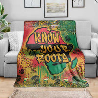 Graffiti African map throw blanket in multicolor on gray sofa