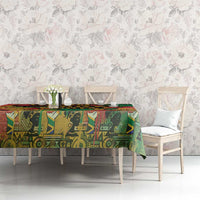 Rectangular graffiti African map tablecloth on table with white dining chairs