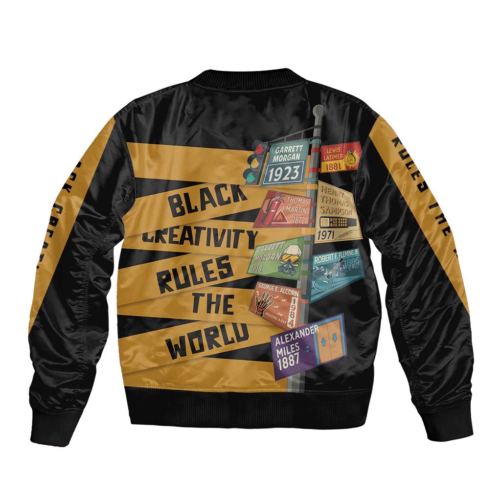 Black bomber jacket with gold stripes, ribbed cuffs, and colorful patch collage panel