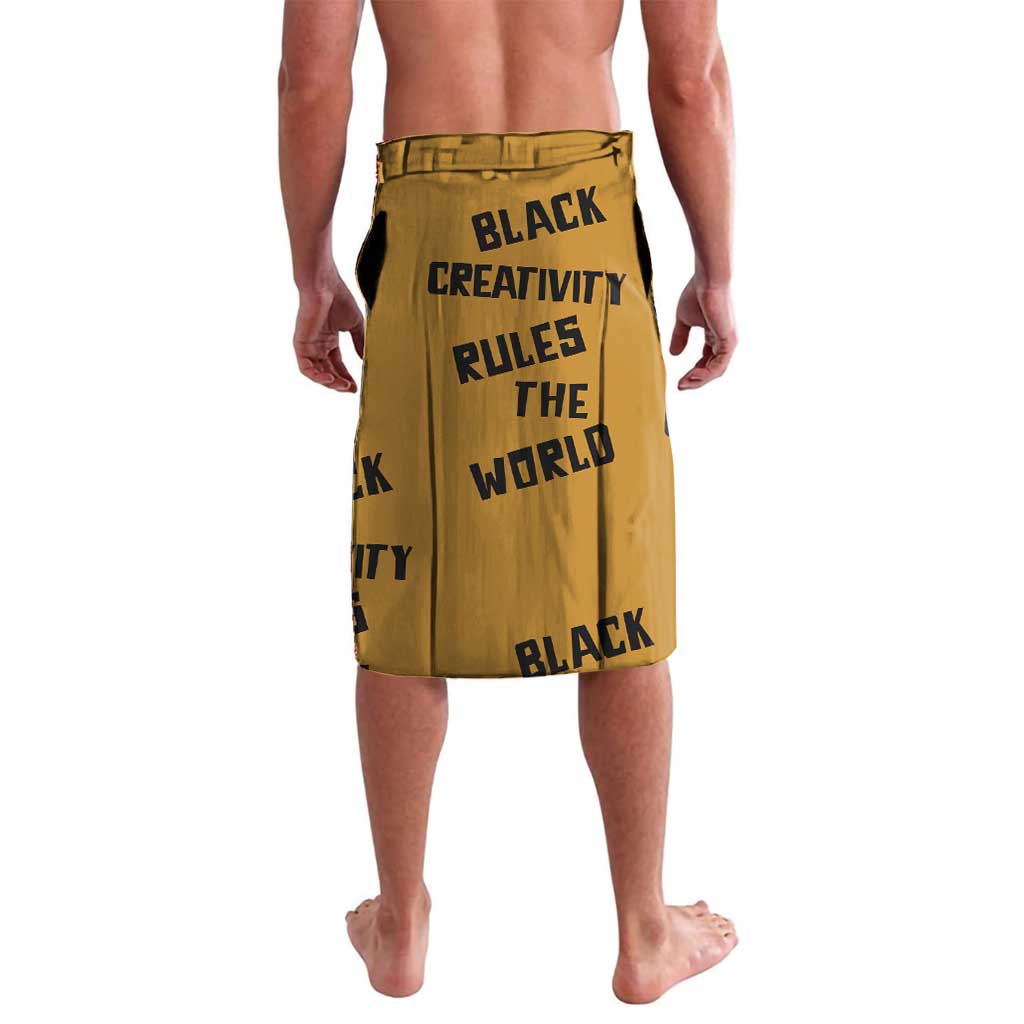 Yellow wrap skirt with bold black BLACK CREATIVITY RULES THE WORLD text