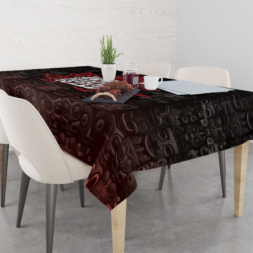 Dark brown tablecloth draped over dining table with red-and-white Canada map centerpiece