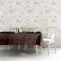 Dark tablecloth on dining set with red-and-white Canada map graphic and patterned fabric