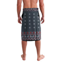 Lavalava sarong skirt in dark blue with festive border, snowflake and house patterns