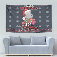 Blue Christmas wall tapestry with cartoon hippo wearing green scarf, holding gift boxes, 'For Christmas' lettering.