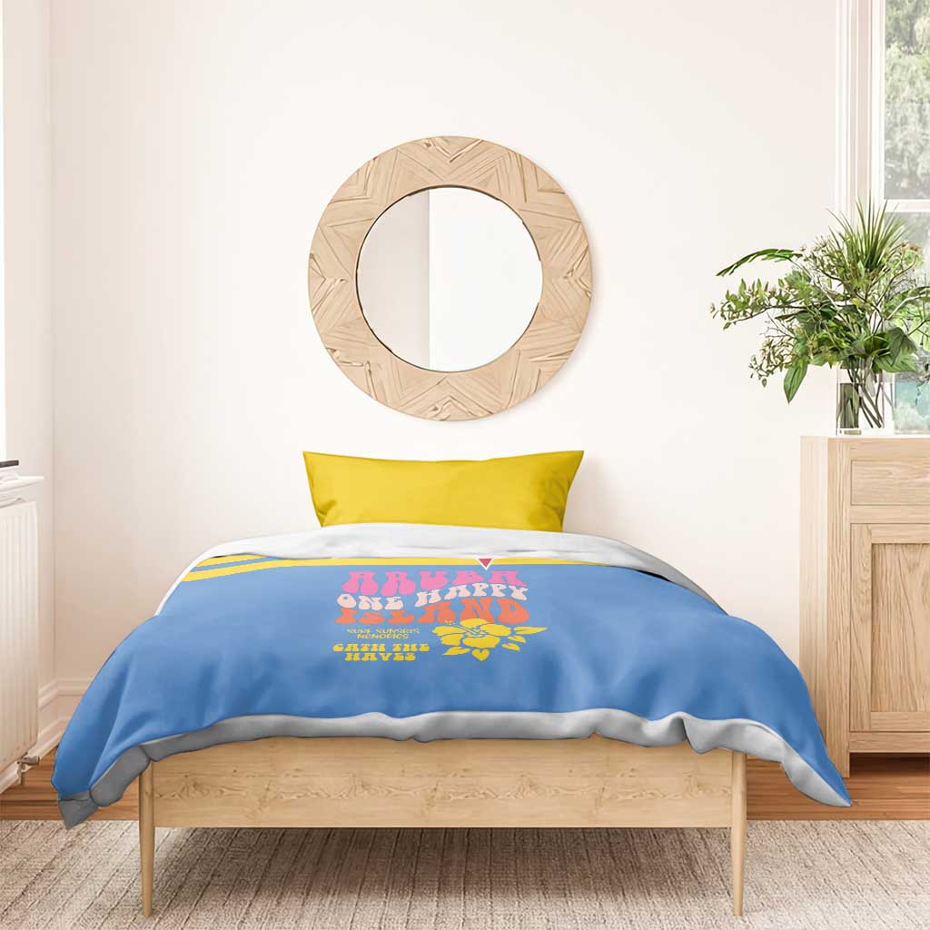 Blue comforter with yellow pillow; island graphic and stripes on bed with wooden frame