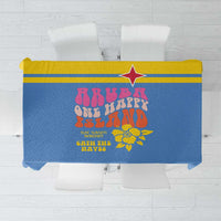 Blue tablecloth with yellow border and colorful island celebration graphic