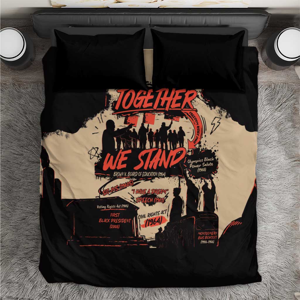 Black bedding set with “Together We Stand” graphic on cream panel and two black pillows
