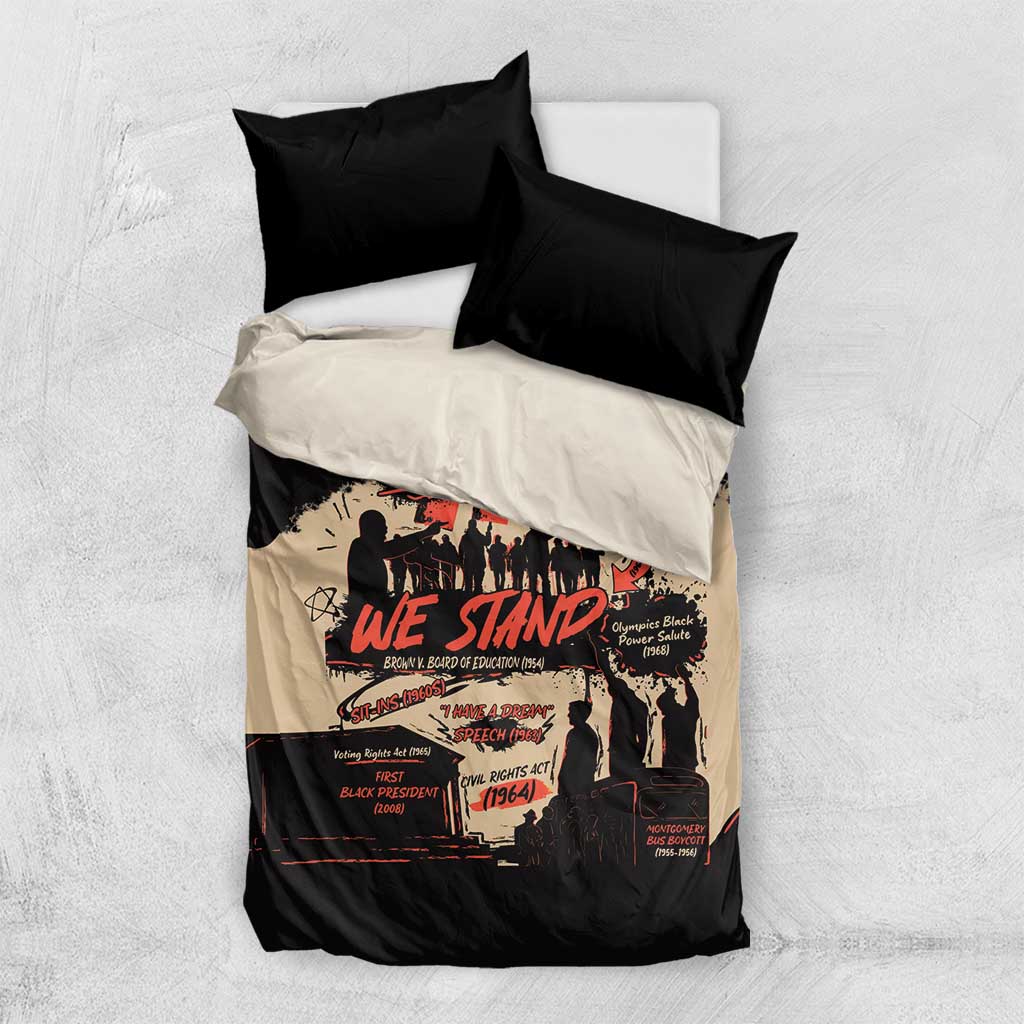Black and cream bedding set with “Together We Stand” graphic duvet and two black pillowcases