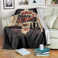 Black and tan Together We Stand print blanket with large red lettering and figures