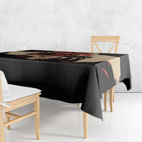 Black tablecloth with illustrated unity band, hanging over table edge