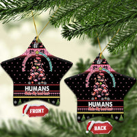 Black star-shaped ceramic Christmas ornaments with Flamingo Humans graphic; gold loop; Front/Back