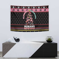 Black Christmas tapestry with flamingo graphic and 'HUMANS' banner, centered